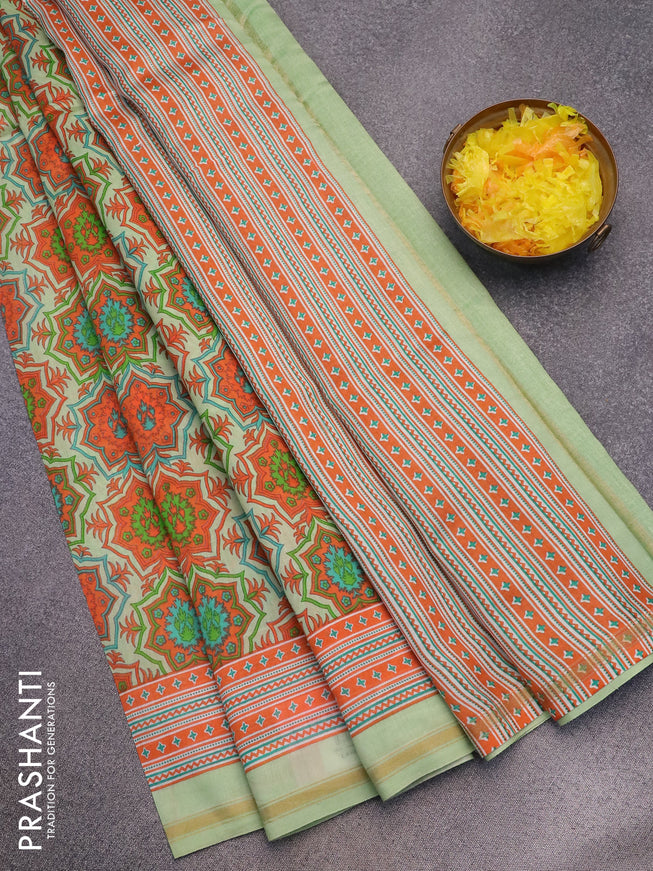 Chanderi silk cotton saree pista green with allover prints and small zari woven border
