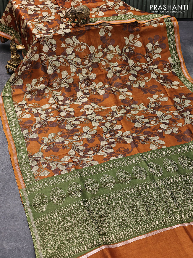 Chanderi silk cotton saree dark mustard and green with allover prints and small zari woven border