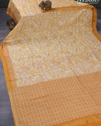 Chanderi silk cotton saree cream and mustard yellow with allover prints and small zari woven border