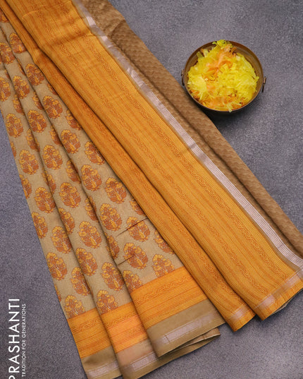 Chanderi silk cotton saree sandal and yellow with allover floral butta prints and small zari woven border