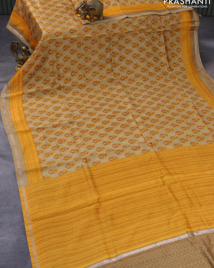 Chanderi silk cotton saree sandal and yellow with allover floral butta prints and small zari woven border