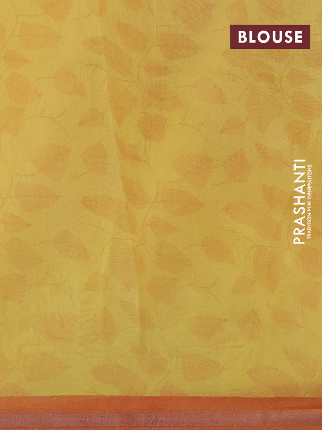 Chanderi silk cotton saree pale yellow and orange with allover floral prints and samll zari woven border