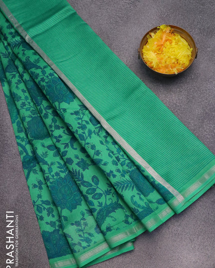 Chanderi silk cotton saree green with allover floral prints and small zari woven border