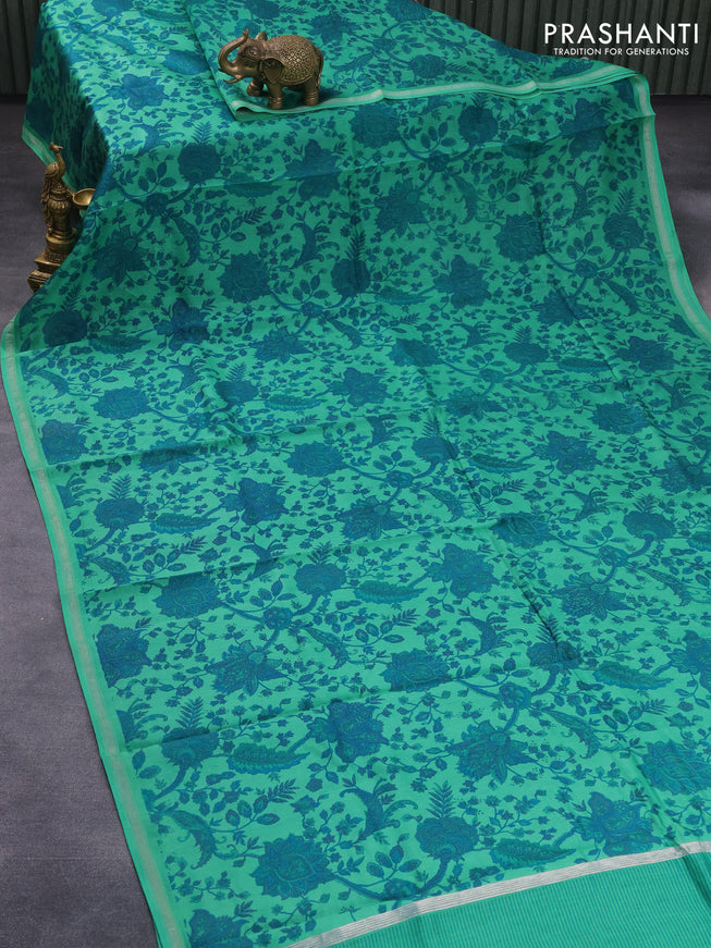 Chanderi silk cotton saree green with allover floral prints and small zari woven border
