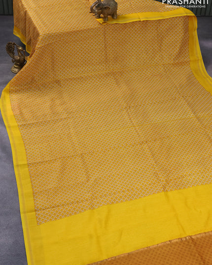 Chanderi silk cotton saree yellow with allover geometric prints and small zari woven border