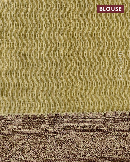 Chanderi silk cotton saree elaichi green with allover zig zag prints and woven border
