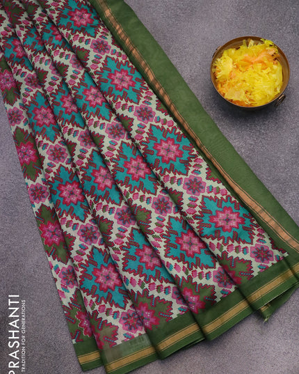 Chanderi silk cotton saree pastel green and green with allover ikat prints and small zari woven border