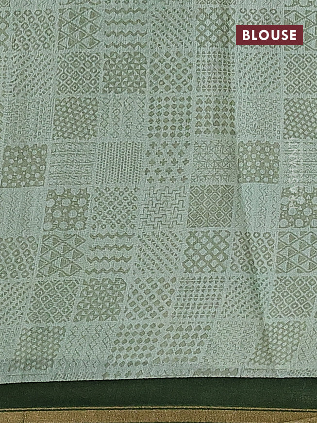 Chanderi silk cotton saree pastel green and green with allover ikat prints and small zari woven border