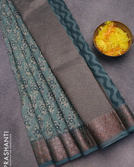 Chanderi silk cotton saree pastel blue shade with allover floral butta prints and woven border