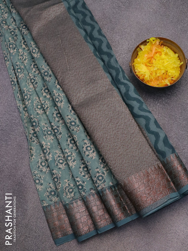 Chanderi silk cotton saree pastel blue shade with allover floral butta prints and woven border
