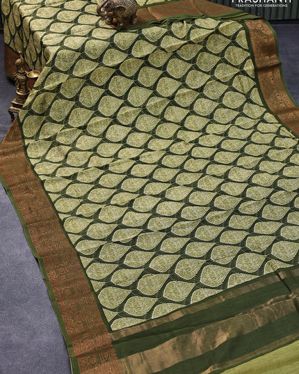 Chanderi silk cotton saree light green and green with allover prints and woven border
