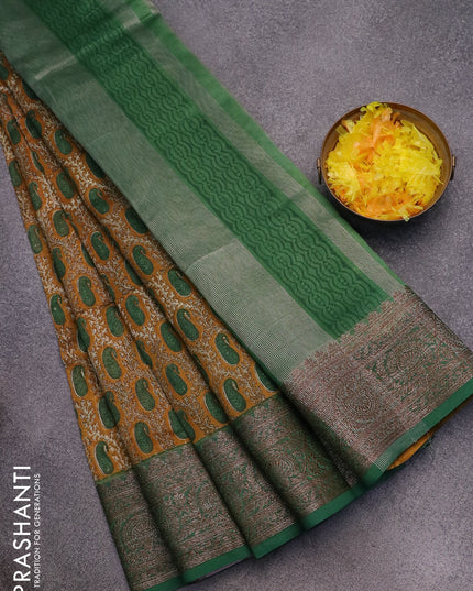 Chanderi silk cotton saree dark mustard and green with allover paisley prints and woven border
