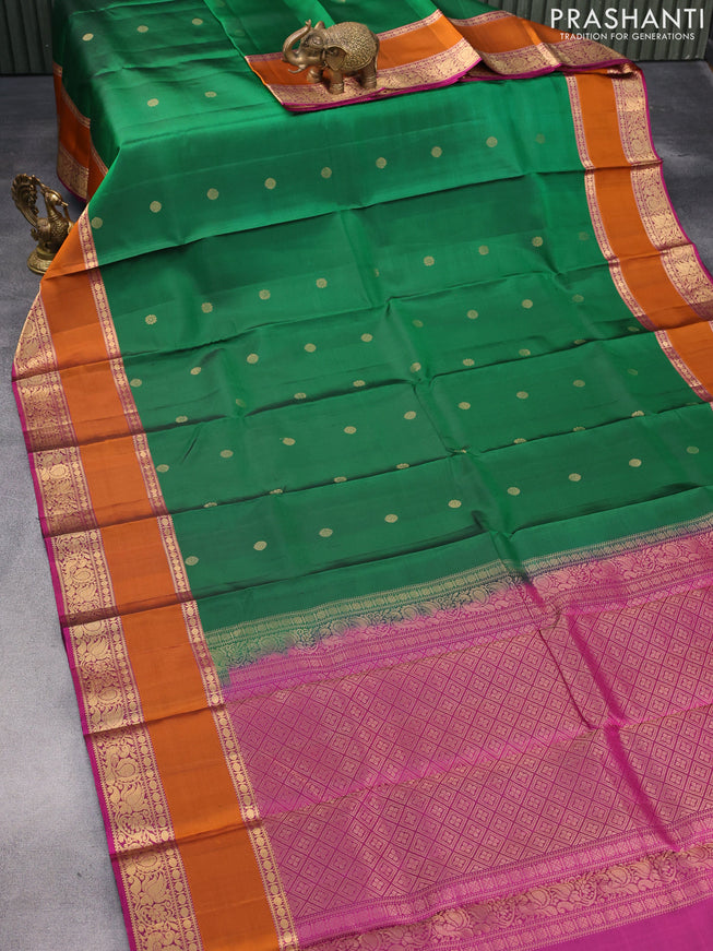 Pure soft silk saree green and orange magenta pink with allover zari woven buttas and rettapet zari woven annam border