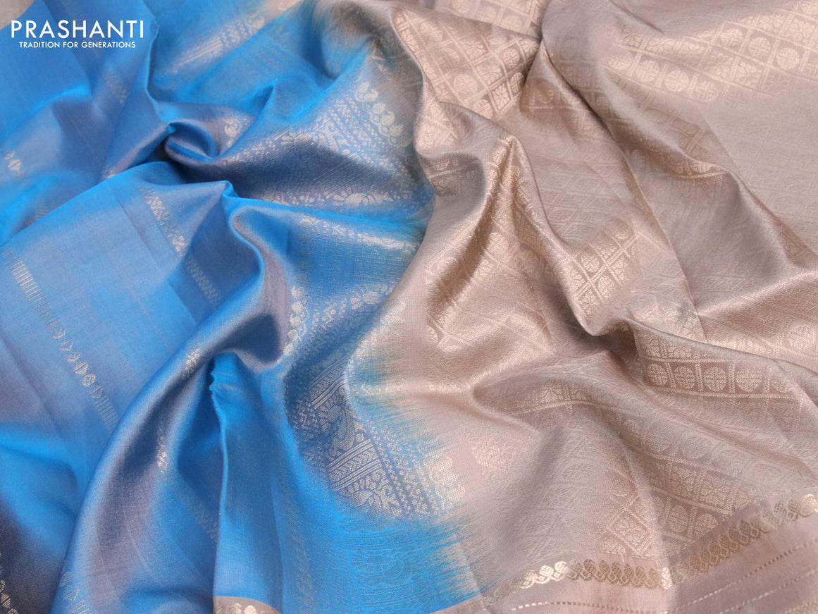 Pure soft silk saree dual shade of blue and grey shade with allover silver zari weaves and rettapet long zari woven border