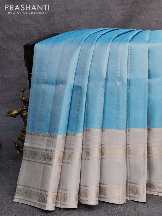 Pure soft silk saree light blue and grey with allover silver zari weaves and rettapet silver zari woven border