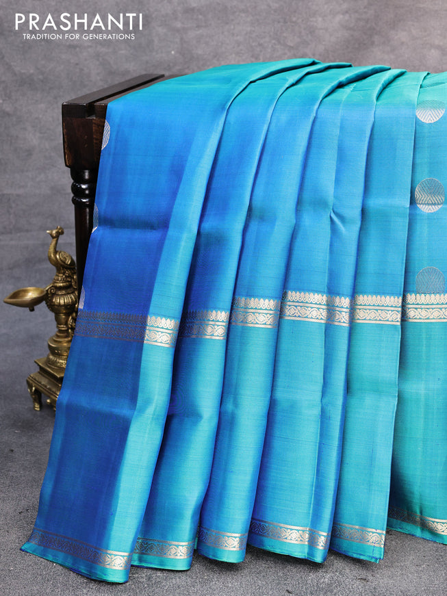 Pure soft silk saree dual shade of bluish green with annam & rudhraksha zari woven buttas and long rettapet zari woven border