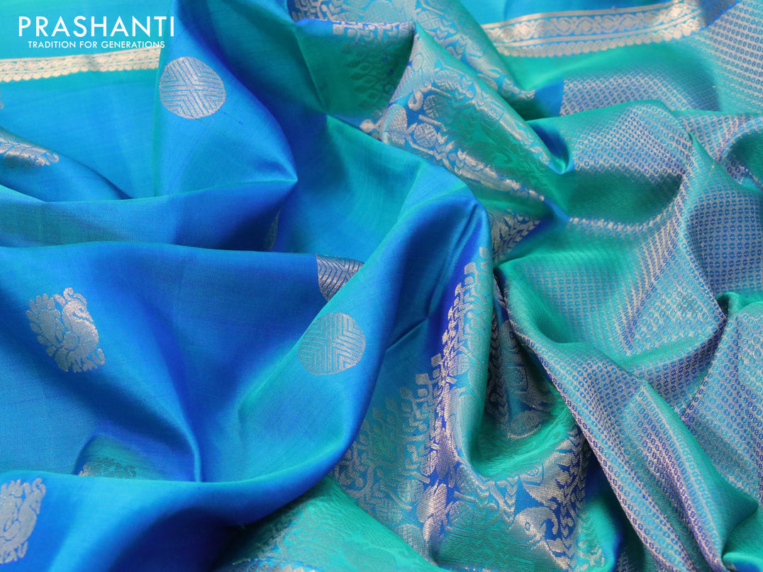 Pure soft silk saree dual shade of bluish green with annam & rudhraksha zari woven buttas and long rettapet zari woven border