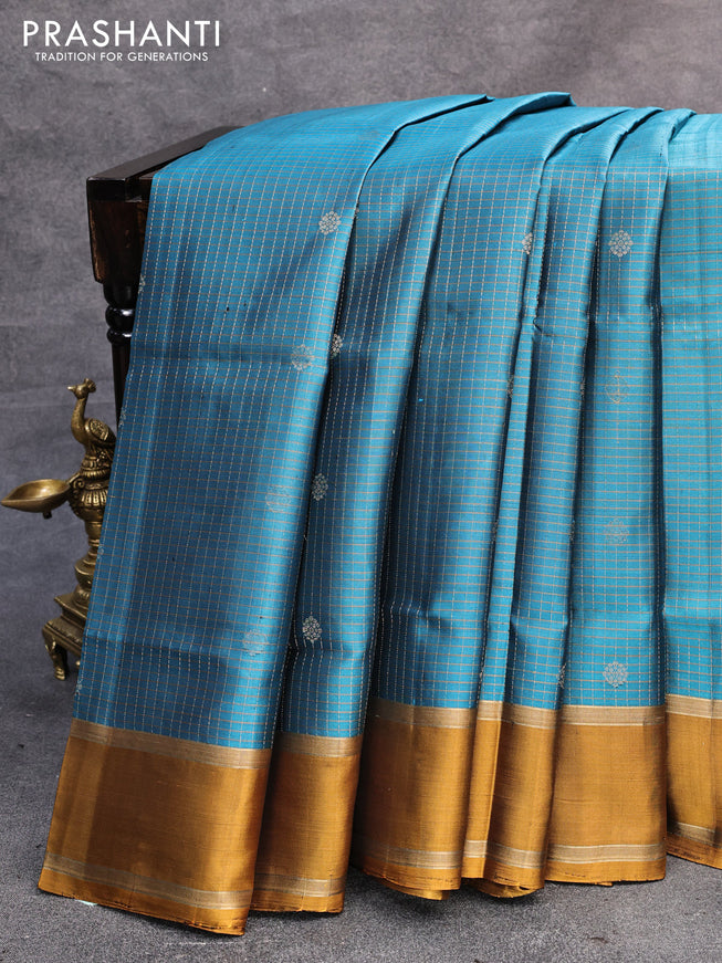 Pure soft silk saree peacock blue and mustard yellow with allover small checked pattern & buttas and rettapet zari woven border