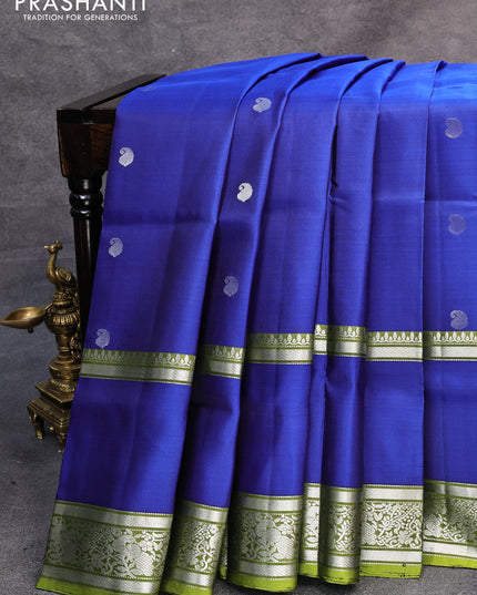 Pure soft silk saree blue and light green with silver zari woven paisley buttas and long rettapet silver zari woven border
