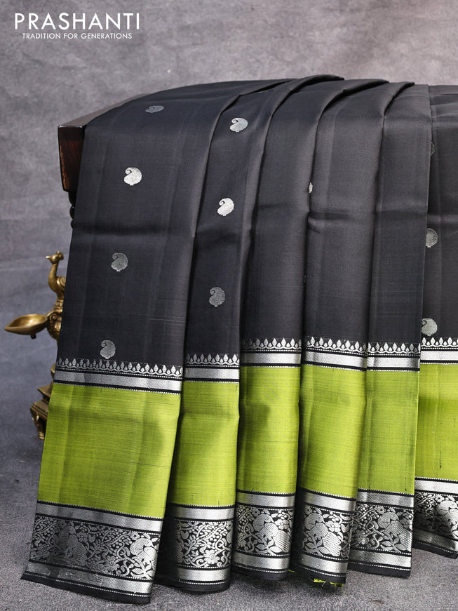 Pure soft silk saree black and light green with silver zari woven paisley buttas and long rettapet silver zari woven border