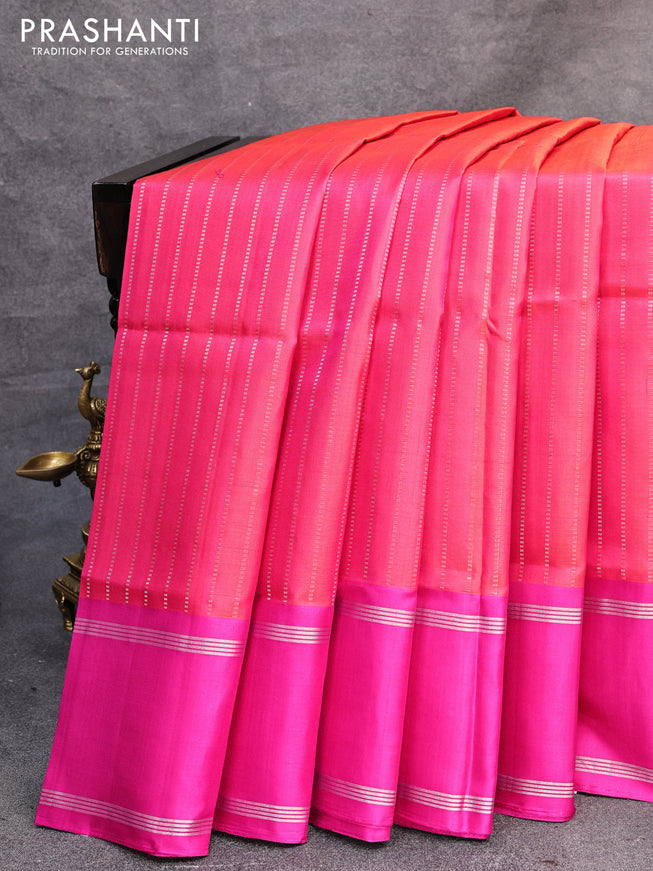 Pure soft silk saree dual shade of orange and pink with allover silver zari weaves and rettapet silver zari woven border