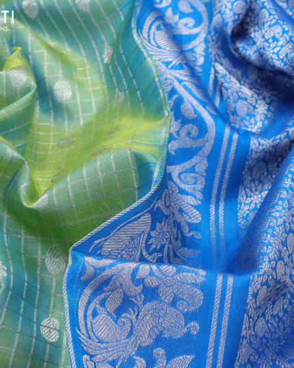 Venkatagiri silk saree dual shade of teal bluish green and cs blue with allover silver checks & butta weaves and long rich silver zari woven border