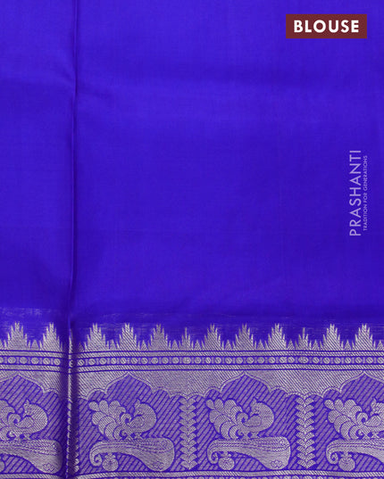 Venkatagiri silk saree dual shade of rustic orange and blue with silver zari woven buttas and rich silver zari woven border