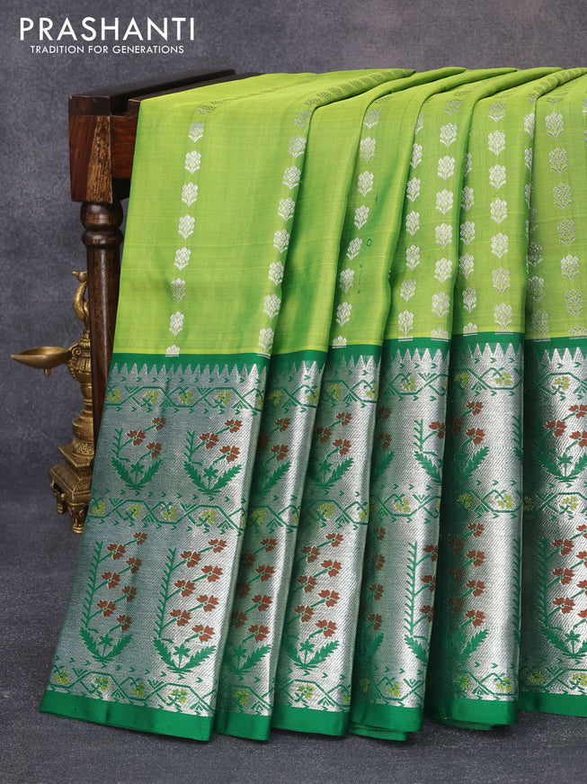 Venkatagiri silk saree light green and green with allover silver zari woven floral buttas and long silver zari woven floral paithani border
