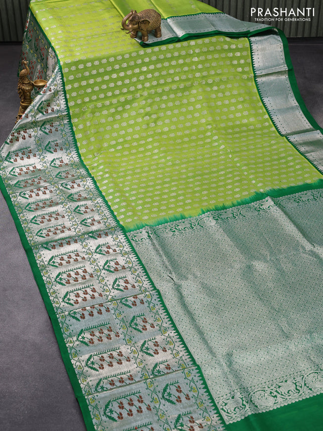 Venkatagiri silk saree light green and green with allover silver zari woven floral buttas and long silver zari woven floral paithani border