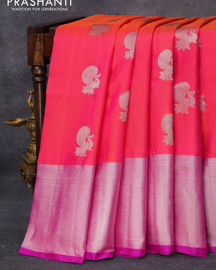 Venkatagiri silk saree dual shade of pinkish orange and purple with silver zari woven peacock buttas and long silver zari woven border