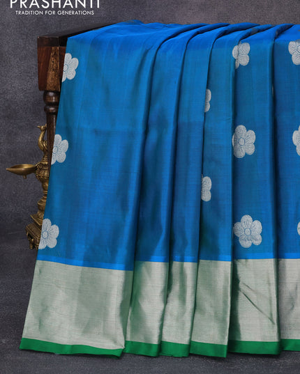 Venkatagiri silk saree dual shade of cs blue and green with floral silver zari woven buttas and silver zari woven border