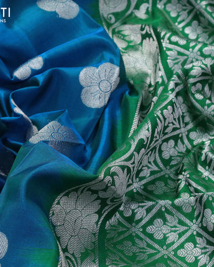 Venkatagiri silk saree dual shade of cs blue and green with floral silver zari woven buttas and silver zari woven border