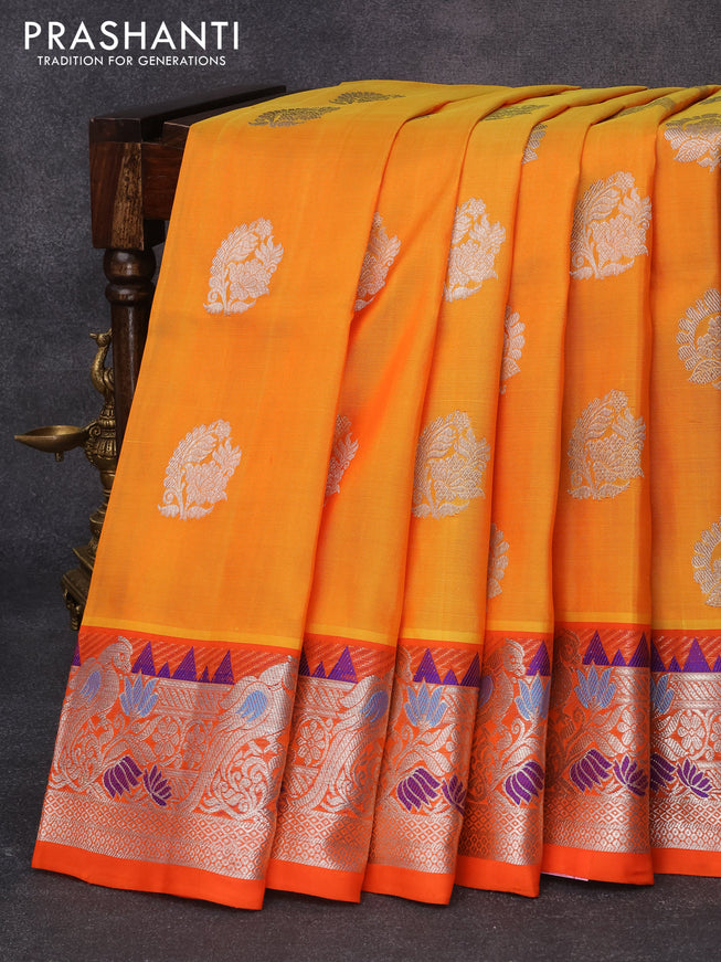 Venkatagiri silk saree mango yellow and orange with silver zari woven floral buttas and rich silver zari woven peacock design paithani border
