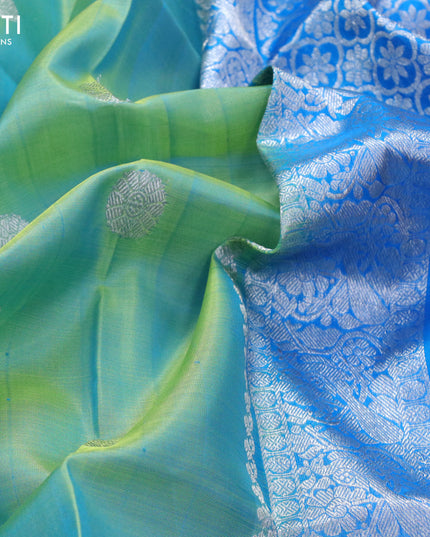 Venkatagiri silk saree dual shade of teal bluish green and cs blue with silver zari woven buttas and rich silver & gold zari woven border