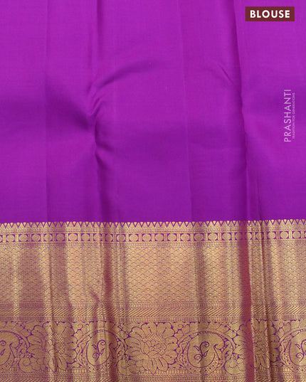 Pure kanjivaram silk saree cream and purple with allover zari woven floral brocade weaves and long rich zari woven floral border
