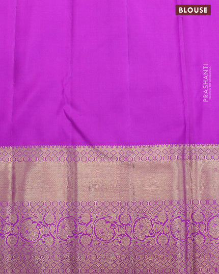 Pure kanjivaram silk saree light pink and purple with allover silver zari woven floral weaves and long zari woven floral border