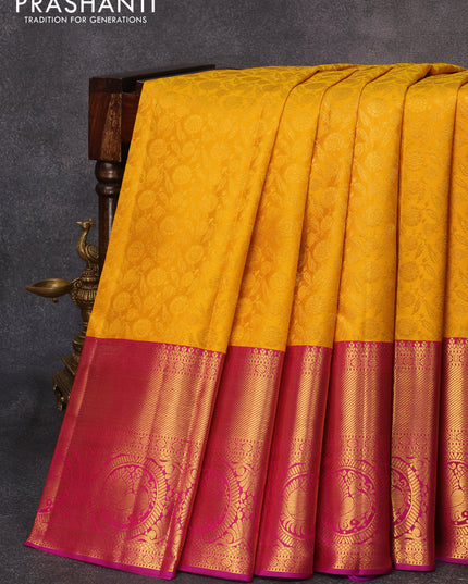 Pure kanjivaram silk saree mustard yellow and dual shade of purple with allover zari woven floral brocade weaves and long zari woven annam border