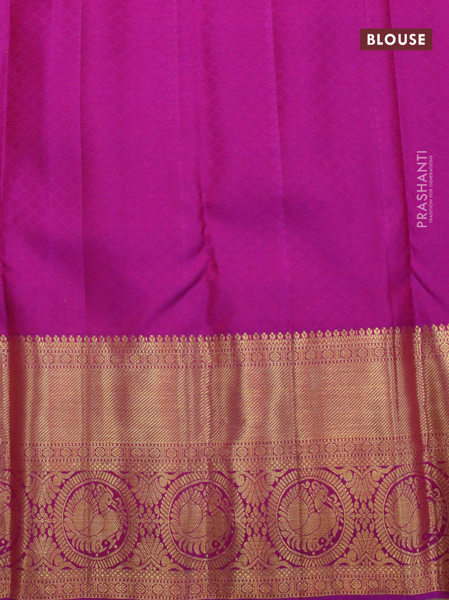 Pure kanjivaram silk saree mustard yellow and dual shade of purple with allover zari woven floral brocade weaves and long zari woven annam border