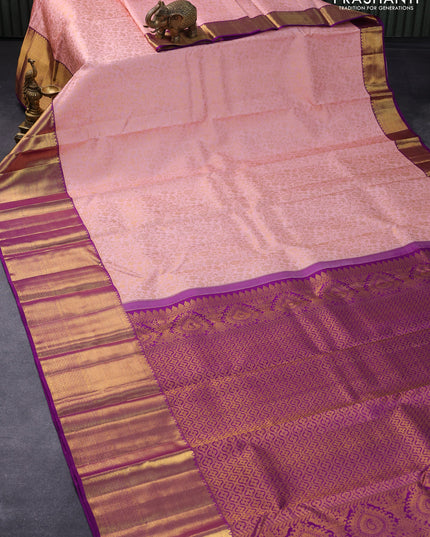 Pure kanjivaram silk saree mild peach and violet with allover zari woven floral brocade weaves and long zari woven border