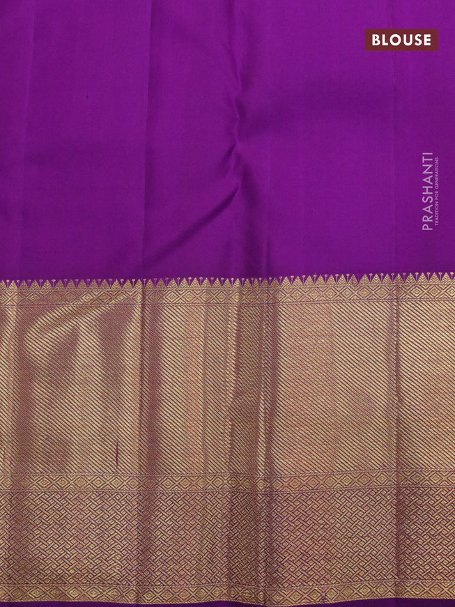 Pure kanjivaram silk saree mild peach and violet with allover zari woven floral brocade weaves and long zari woven border