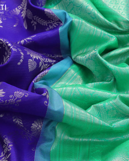 Pure kanjivaram silk saree royal blue and green with allover silver zari woven floral weaves and long silver zari woven border
