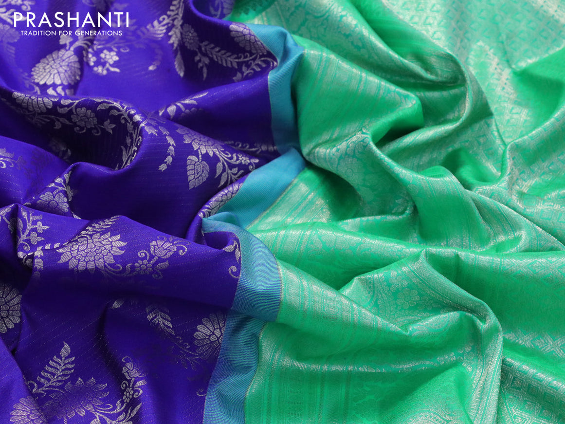 Pure kanjivaram silk saree royal blue and green with allover silver zari woven floral weaves and long silver zari woven border