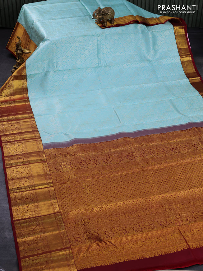 Pure kanjivaram silk saree light blue and maroon with allover silver zari woven brocade weaves and long rich zari woven border
