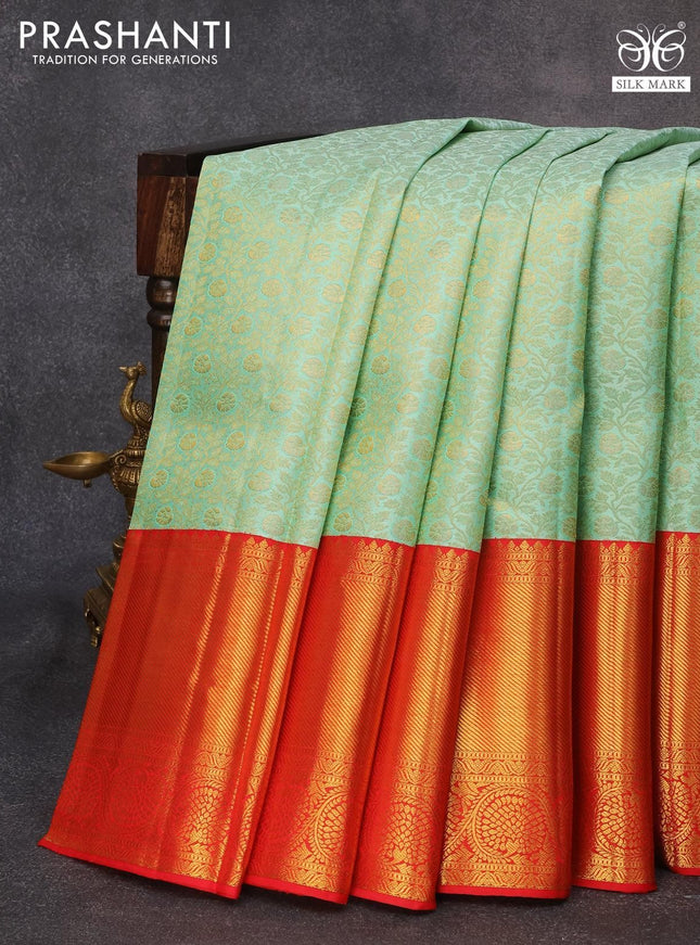 Pure kanjivaram silk saree teal shade and red with allover zari woven floral brocade weaves and long zari woven floral border