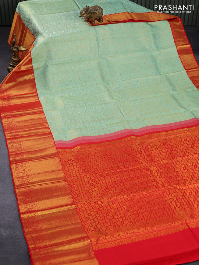 Pure kanjivaram silk saree teal shade and red with allover zari woven floral brocade weaves and long zari woven floral border
