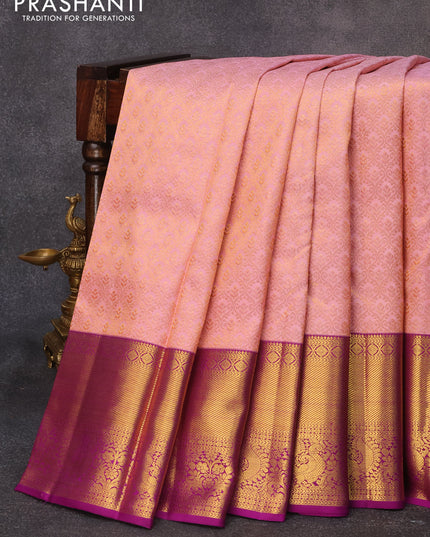 Pure kanjivaram silk saree peach pink and violet with allover zari woven brocade weaves and long rich zari woven annam border