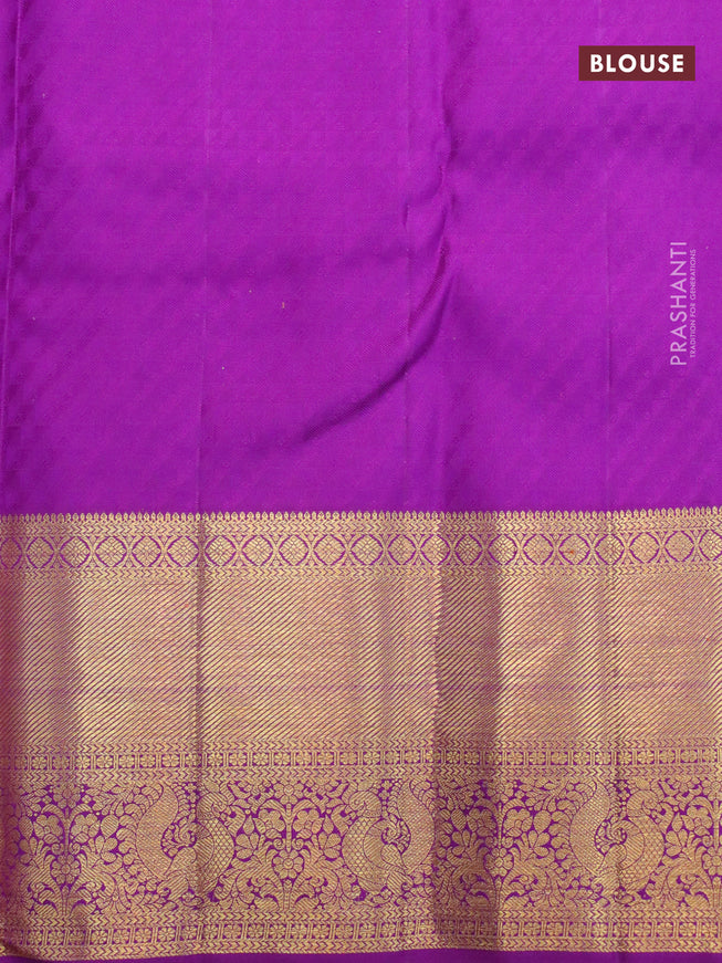 Pure kanjivaram silk saree peach pink and violet with allover zari woven brocade weaves and long rich zari woven annam border