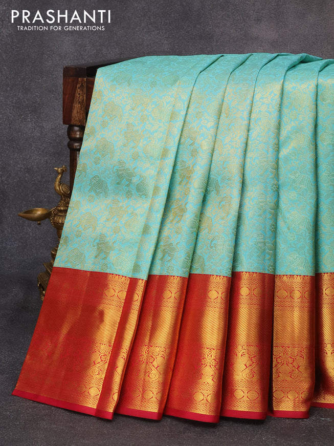 Pure kanjivaram silk saree teal blue and maroon with allover zari woven brocade weaves and long rich zari woven border