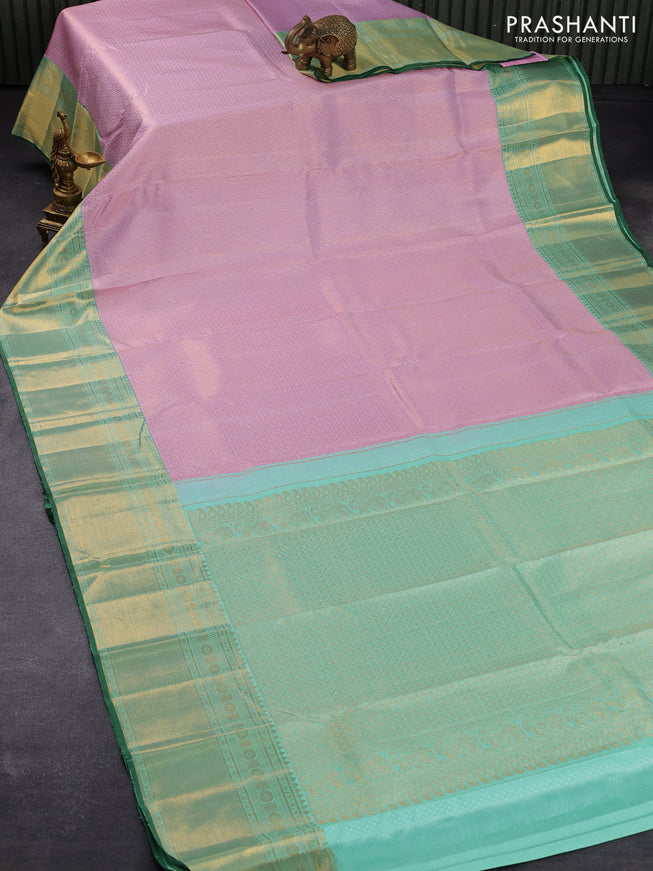 Pure kanjivaram silk saree lotus pink and teal blue with allover zari weaves and rich zari woven border
