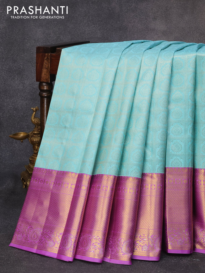 Pure kanjivaram silk saree teal blue and lavender with allover silver zari woven brocade weaves and long rich zari woven border
